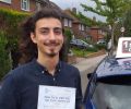 Alexander with Driving test pass certificate